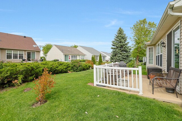 13538 Lehigh St, Huntley, IL 60142 - view of grassy yard featuring a patio area and a residential view