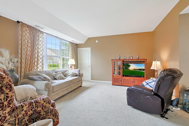 13538 Lehigh St, Huntley, IL 60142 - living area featuring light carpet, baseboards, and vaulted ceiling