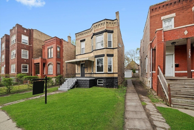 7421 S Eggleston Ave, Chicago, IL 60621 - view of property featuring a front yard