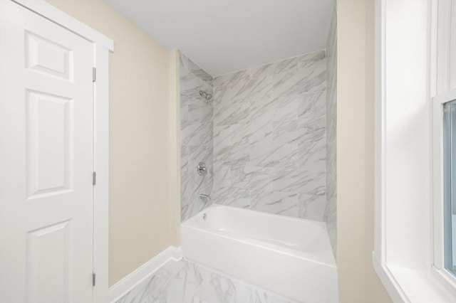 7421 S Eggleston Ave, Chicago, IL 60621 - bathroom with baseboards, bathtub / shower combination, and marble look tiles