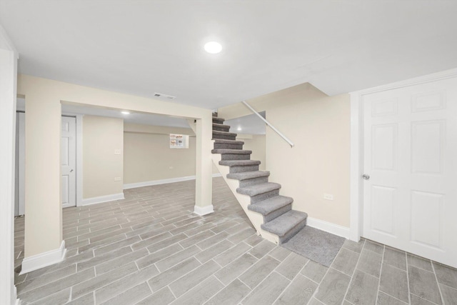 7421 S Eggleston Ave, Chicago, IL 60621 - finished basement featuring baseboards, stairs, light wood-style flooring, and recessed lighting