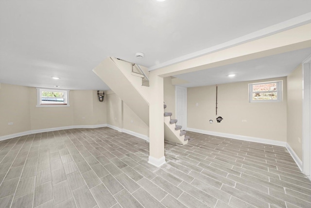 7421 S Eggleston Ave, Chicago, IL 60621 - basement featuring stairway, baseboards, and recessed lighting