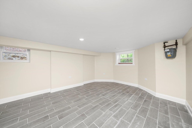 7421 S Eggleston Ave, Chicago, IL 60621 - below grade area with gas meter, baseboards, recessed lighting, and wood finished floors