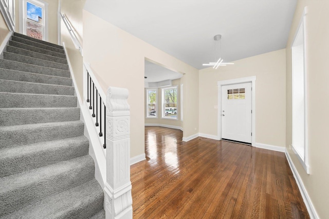 7421 S Eggleston Ave, Chicago, IL 60621 - foyer with dark wood finished floors, stairway, and baseboards