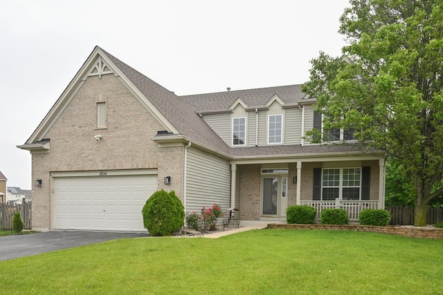 1804 Westbrook Ct, Plainfield, IL 60586 - traditional-style home with covered porch, driveway, brick siding, and a shingled roof