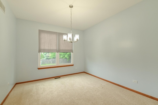 1804 Westbrook Ct, Plainfield, IL 60586 - carpeted empty room with a chandelier and baseboards