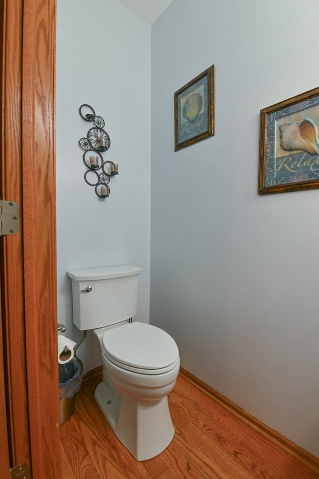 1804 Westbrook Ct, Plainfield, IL 60586 - bathroom with toilet, wood finished floors, and baseboards