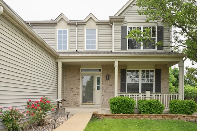 1804 Westbrook Ct, Plainfield, IL 60586 - view of exterior entry with a porch and brick siding