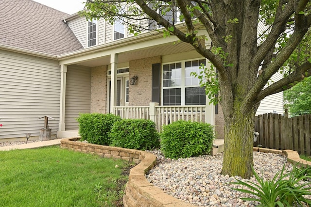 1804 Westbrook Ct, Plainfield, IL 60586 - entrance to property featuring a shingled roof, a porch, and brick siding
