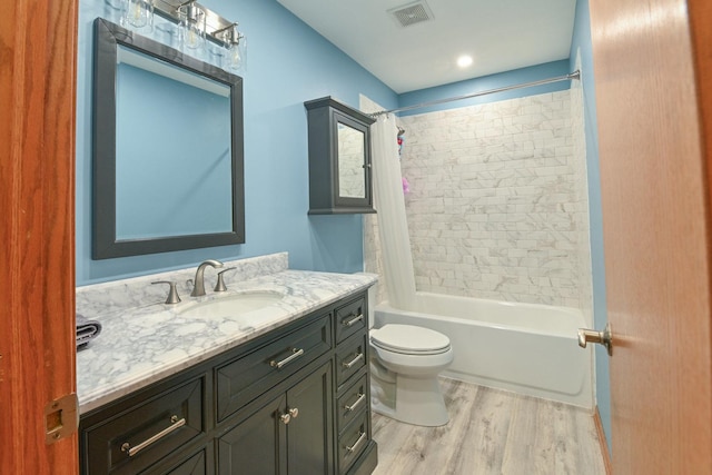 1804 Westbrook Ct, Plainfield, IL 60586 - bathroom with wood finished floors, vanity, toilet, and shower / bathtub combination with curtain