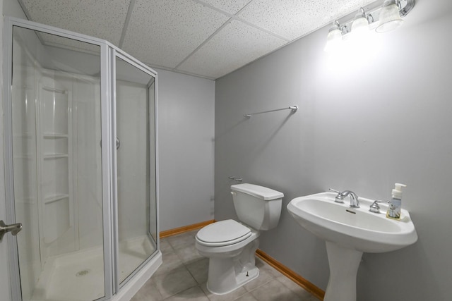 1804 Westbrook Ct, Plainfield, IL 60586 - full bath with a paneled ceiling, a stall shower, toilet, tile patterned floors, and baseboards
