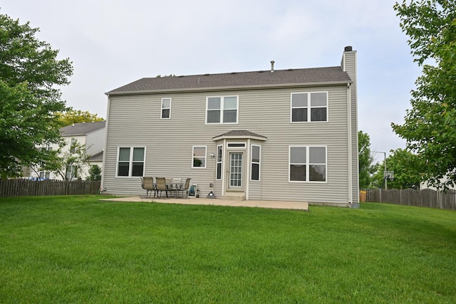 1804 Westbrook Ct, Plainfield, IL 60586 - rear view of house with a chimney and a patio area