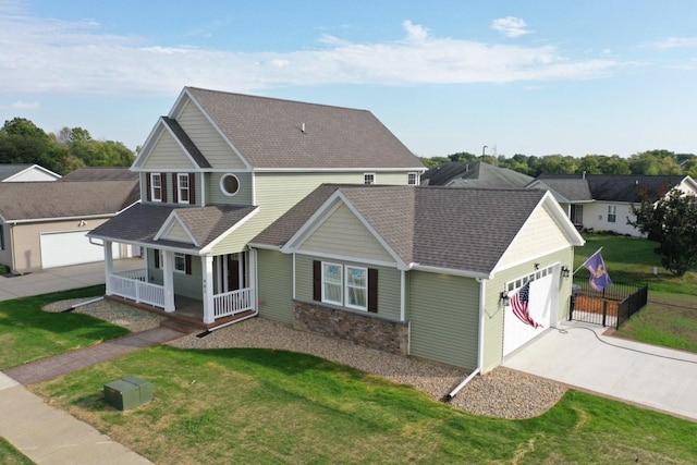 981 W Forsyth Rd, Forsyth, IL 62535 - view of front of house featuring a porch, an attached garage, driveway, a front yard, and stone siding