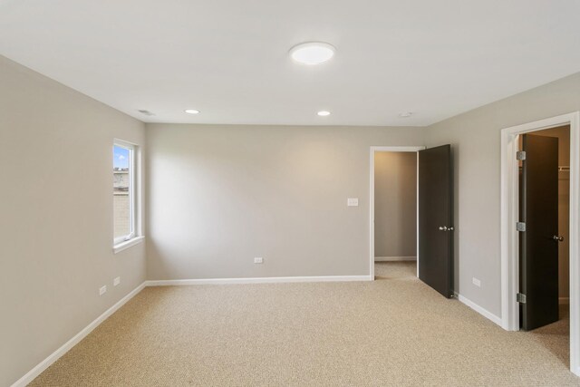 22429 Karlov Ave, Richton Park, IL 60471 - empty room featuring light carpet, baseboards, and recessed lighting