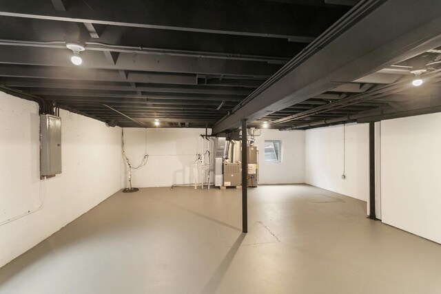 22429 Karlov Ave, Richton Park, IL 60471 - basement with electric panel, gas water heater, and heating unit