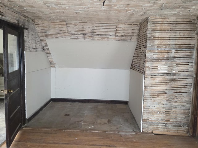 114 W 108th Pl, Chicago, IL 60628 - unfurnished dining area featuring baseboards and vaulted ceiling