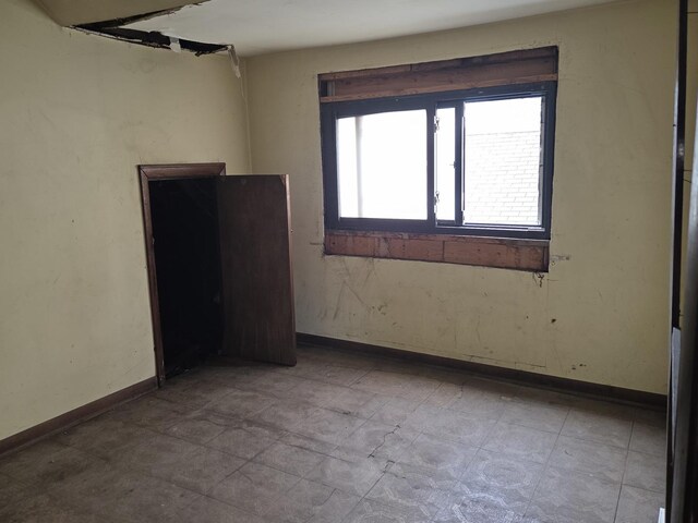114 W 108th Pl, Chicago, IL 60628 - spare room with baseboards