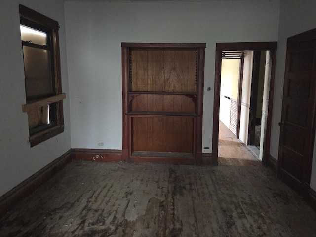 114 W 108th Pl, Chicago, IL 60628 - unfurnished bedroom featuring wood finished floors and baseboards