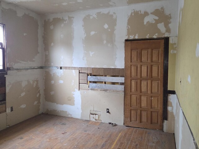 114 W 108th Pl, Chicago, IL 60628 - unfurnished room featuring wood-type flooring