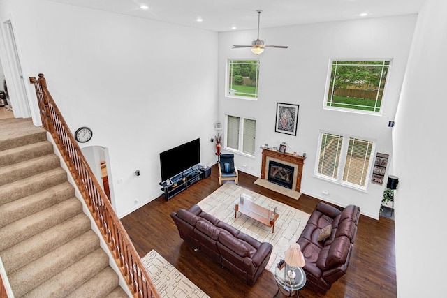 731 W Kenilworth Ave, Palatine, IL 60067 - living area featuring wood finished floors, plenty of natural light, recessed lighting, a high ceiling, and a premium fireplace