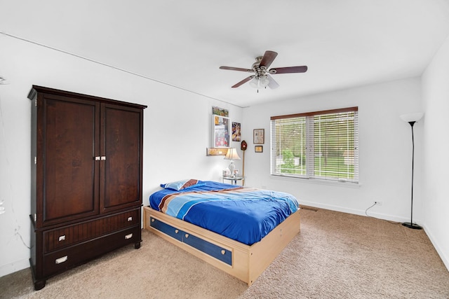 731 W Kenilworth Ave, Palatine, IL 60067 - bedroom with light colored carpet, baseboards, and ceiling fan