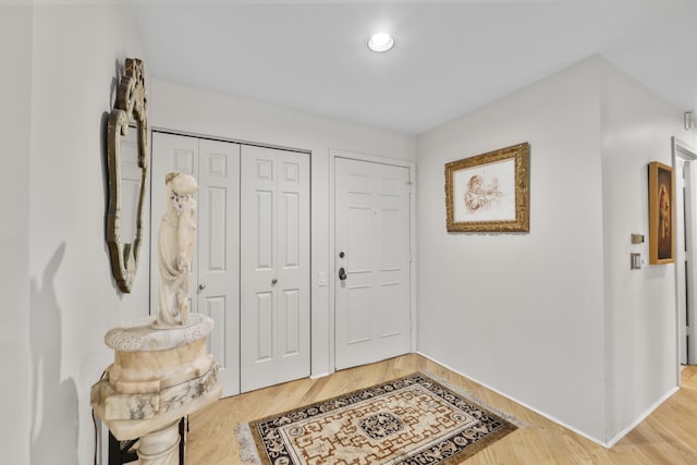 1771 Mission Hills Rd Unit 412, Northbrook, IL 60062 - entrance foyer featuring light wood finished floors, baseboards, and recessed lighting