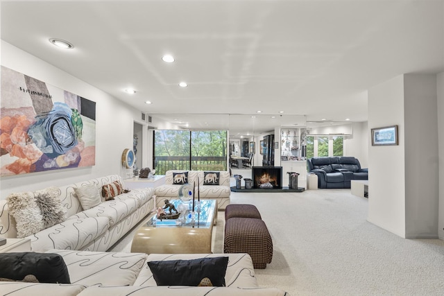 1771 Mission Hills Rd Unit 412, Northbrook, IL 60062 - carpeted living area with recessed lighting and a warm lit fireplace