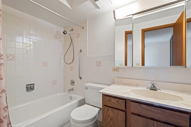 6950 W Forest Preserve Dr Unit 215, Norridge, IL 60706 - bathroom featuring shower / tub combo with curtain, toilet, vanity, tile walls, and backsplash