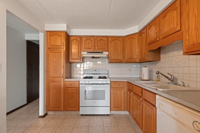 6950 W Forest Preserve Dr Unit 215, Norridge, IL 60706 - kitchen featuring white appliances, a sink, under cabinet range hood, decorative backsplash, and a textured ceiling