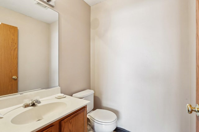 5 Crimson Ct, Lake In The Hills, IL 60156 - half bathroom featuring toilet and vanity