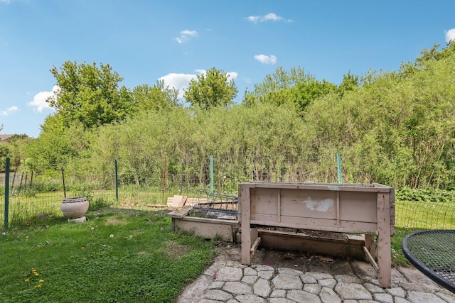 5 Crimson Ct, Lake In The Hills, IL 60156 - view of yard with a wooded view and a garden
