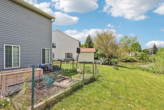 5 Crimson Ct, Lake In The Hills, IL 60156 - view of green lawn with a garden and central AC unit