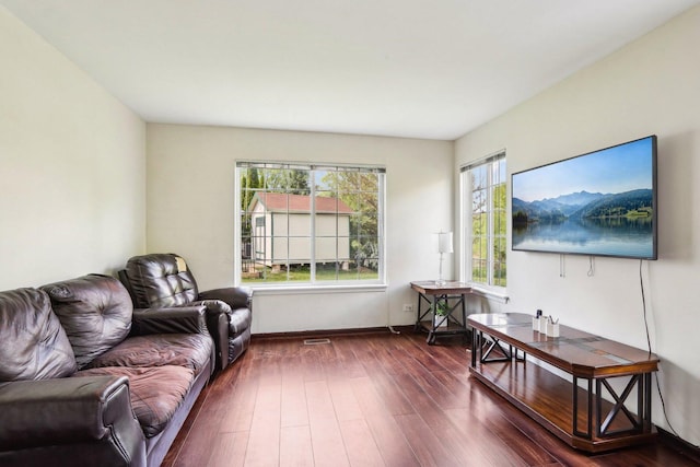 5 Crimson Ct, Lake In The Hills, IL 60156 - living room with dark wood-style flooring and baseboards