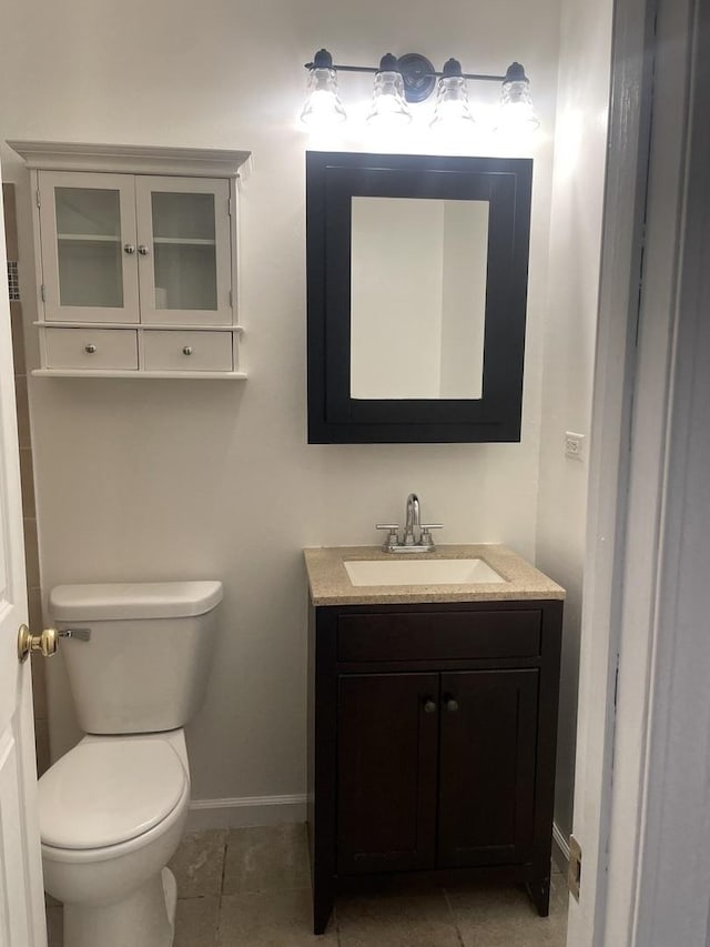 bathroom with vanity and tile patterned floors
