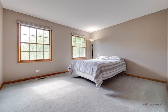 337 S Harrison Ct, Palatine, IL 60067 - carpeted bedroom with baseboards