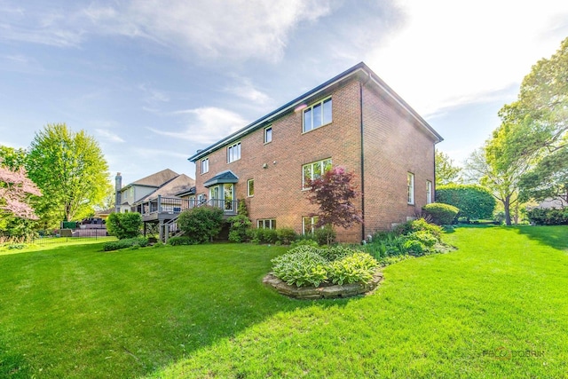337 S Harrison Ct, Palatine, IL 60067 - view of side of home featuring brick siding and a yard