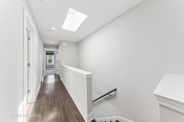3125 S Giles Ave, Chicago, IL 60616 - hallway with an upstairs landing, a skylight, hardwood / wood-style floors, recessed lighting, and baseboards