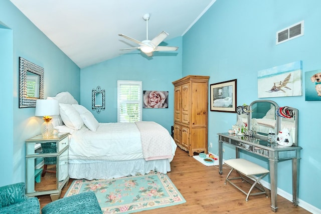 202 Country Ln Unit 202, Des Plaines, IL 60016 - bedroom featuring lofted ceiling, wood finished floors, and ceiling fan