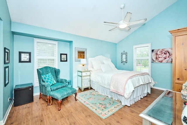 202 Country Ln Unit 202, Des Plaines, IL 60016 - bedroom with wood finished floors, baseboards, high vaulted ceiling, and a ceiling fan