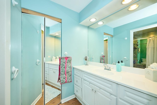 202 Country Ln Unit 202, Des Plaines, IL 60016 - full bathroom with vanity, recessed lighting, and wood finished floors