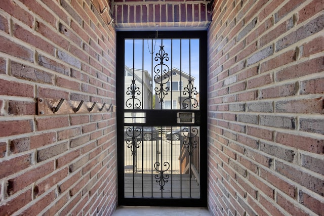 1157 W 19th Pl, Chicago, IL 60608 - doorway to property featuring brick siding
