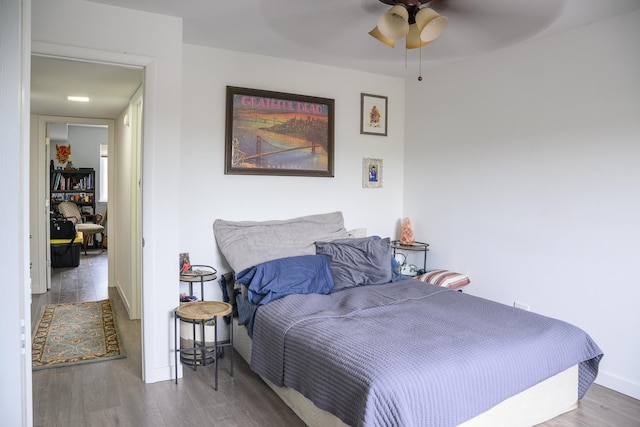 9452 Bay Colony Dr Unit 2W, Des Plaines, IL 60016 - bedroom with wood finished floors, baseboards, and a ceiling fan