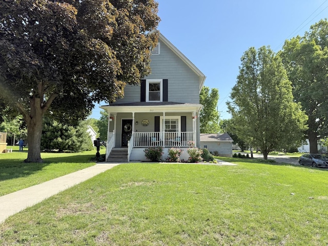 202 17th Ave, Sterling, IL 61081 - view of front of house with a porch and a front lawn