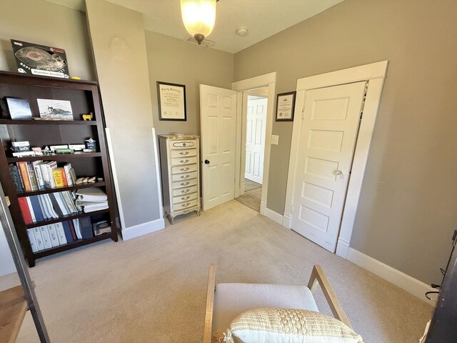 202 17th Ave, Sterling, IL 61081 - sitting room featuring light carpet and baseboards