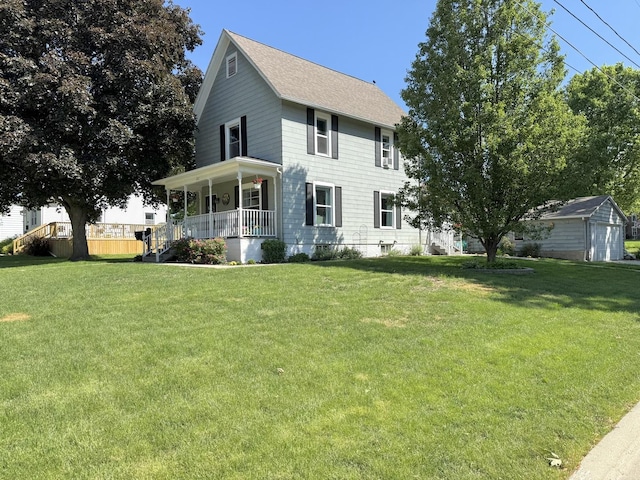 202 17th Ave, Sterling, IL 61081 - view of front facade with covered porch, a front yard, and a shingled roof