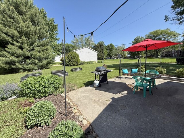 202 17th Ave, Sterling, IL 61081 - view of patio featuring a grill
