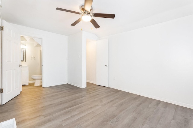 200 Reichman St, Joliet, IL 60433 - unfurnished bedroom featuring light wood-style flooring, ensuite bath, baseboards, and a ceiling fan