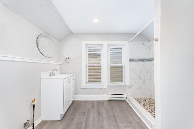 200 Reichman St, Joliet, IL 60433 - full bathroom with vaulted ceiling, a marble finish shower, vanity, wood finished floors, and baseboards