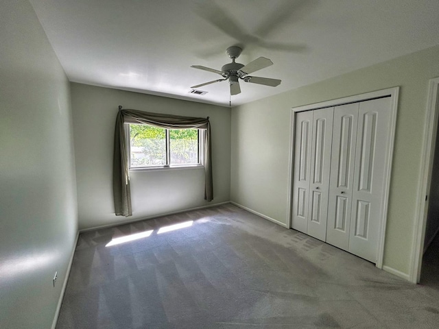 1622 Indian Knoll Rd, Naperville, IL 60565 - unfurnished bedroom featuring carpet floors, a closet, a ceiling fan, and baseboards