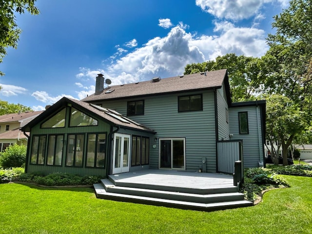 1622 Indian Knoll Rd, Naperville, IL 60565 - back of house with a sunroom, a chimney, a deck, and a yard